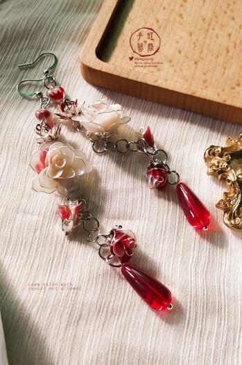 bloodied rose earrings